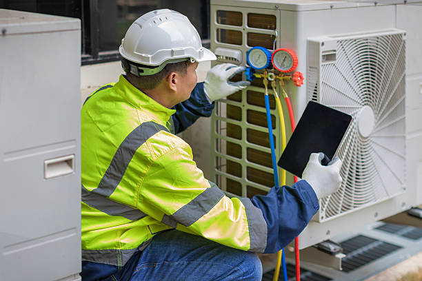 Professional Air Conditioning Repair technician working in Halethorpe, MD